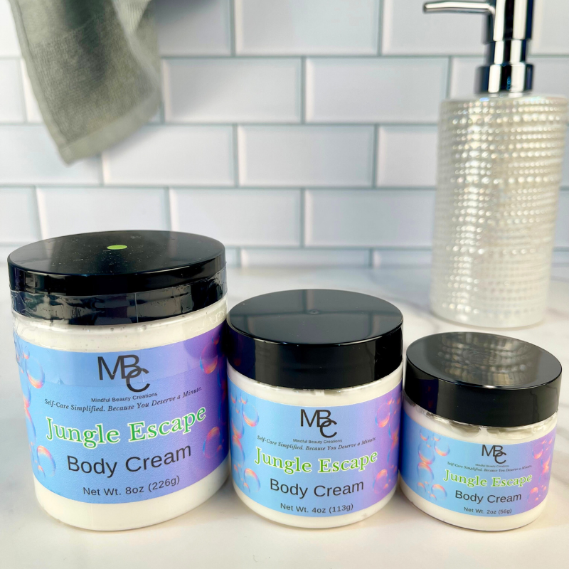 Three jars of Jungle Escape Body Cream on a bathroom counter with a tiled wall background.
