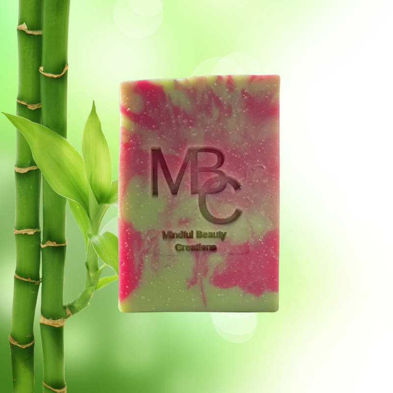 Green and dark pink swirl pattern handmade bar soap. Fresh scent