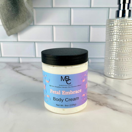 Jar of Petal Embrace Body Cream on a marble surface with a tiled wall background